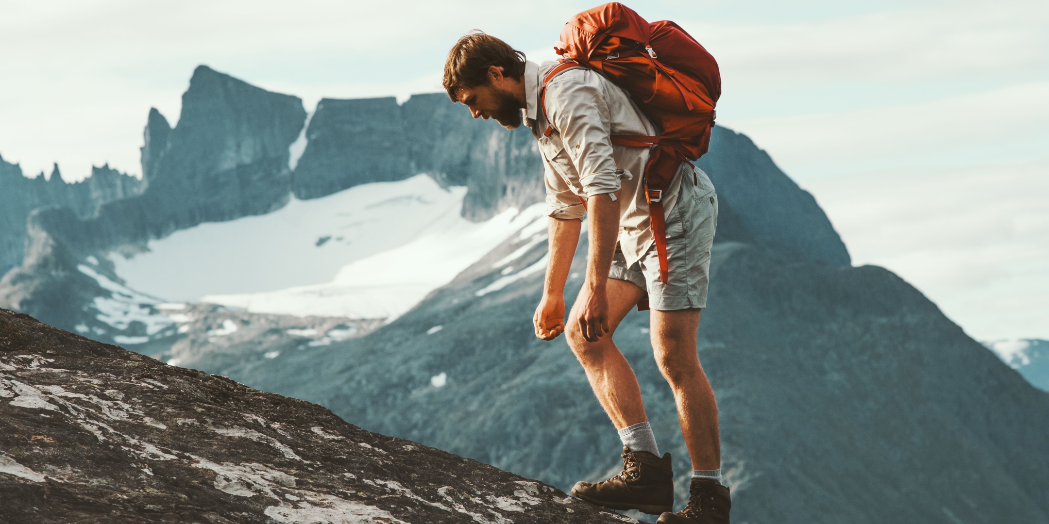 Hiker with a heavy backpack